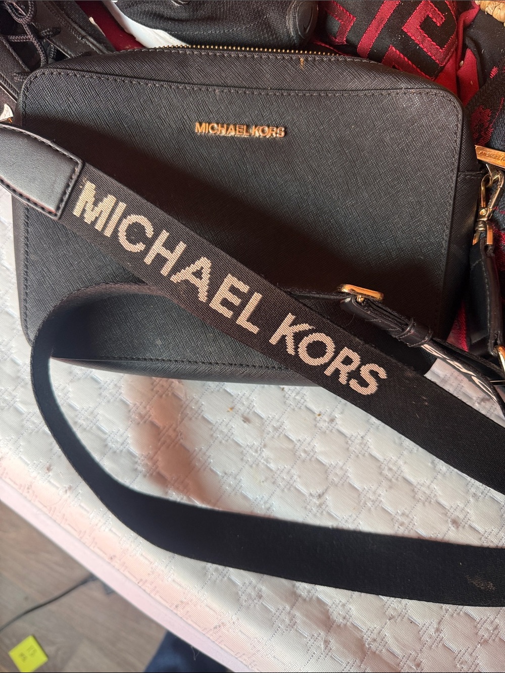 Michael Kors Black Crossbody with Branded Strap and Gold Logo
